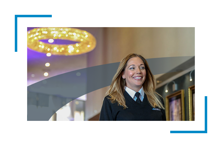 A professional woman in a suit representing leadership in corporate events management